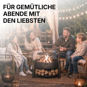 Familie an einem gemütlichen Abend um die CookKing Feuerschale Montana X